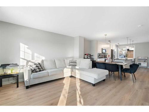 867 Cranston Avenue Se, Calgary, AB - Indoor Photo Showing Living Room