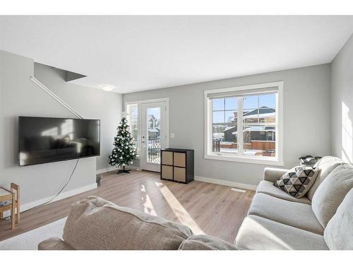 867 Cranston Avenue Se, Calgary, AB - Indoor Photo Showing Living Room