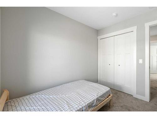 867 Cranston Avenue Se, Calgary, AB - Indoor Photo Showing Bedroom