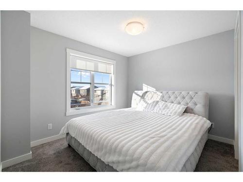 867 Cranston Avenue Se, Calgary, AB - Indoor Photo Showing Bedroom