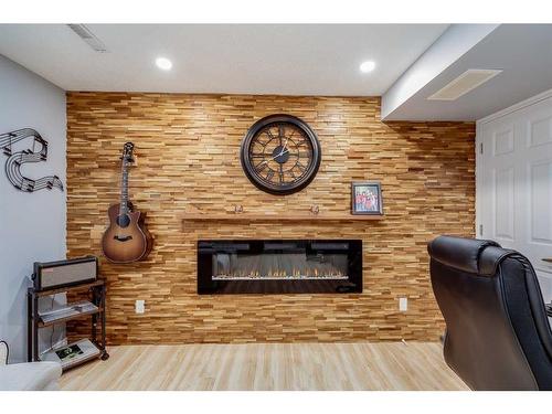 511 Windstone Common Sw, Airdrie, AB - Indoor With Fireplace