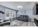 511 Windstone Common Sw, Airdrie, AB  - Indoor Photo Showing Living Room With Fireplace 