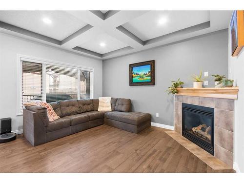 929 Channelside Road Sw, Airdrie, AB - Indoor Photo Showing Living Room With Fireplace