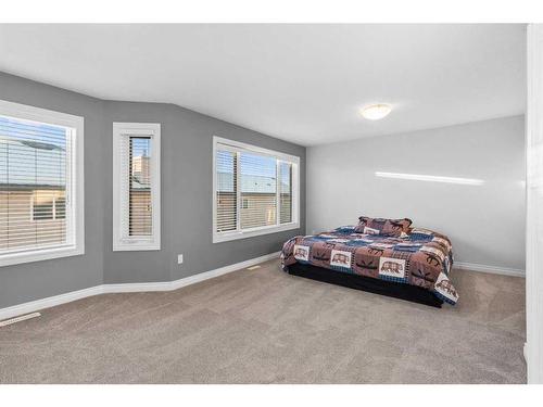 929 Channelside Road Sw, Airdrie, AB - Indoor Photo Showing Bedroom