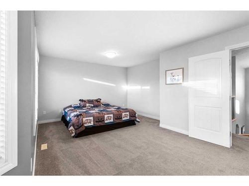 929 Channelside Road Sw, Airdrie, AB - Indoor Photo Showing Bedroom