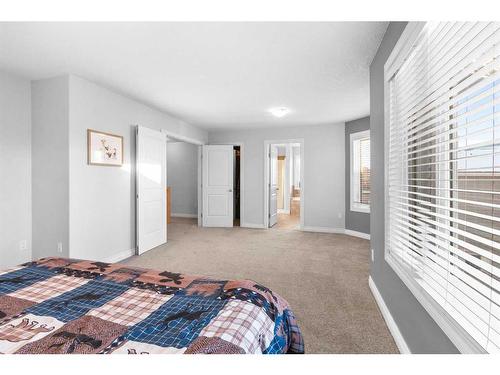 929 Channelside Road Sw, Airdrie, AB - Indoor Photo Showing Bedroom