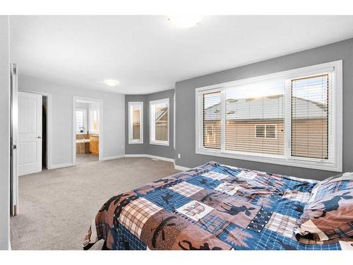 929 Channelside Road Sw, Airdrie, AB - Indoor Photo Showing Bedroom