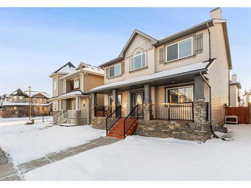 929 Channelside Road Sw, Airdrie, AB - Outdoor With Deck Patio Veranda With Facade