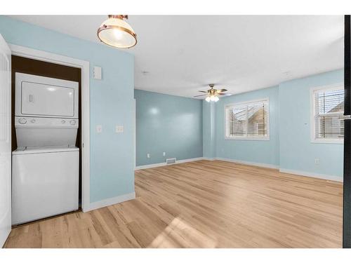 929 Channelside Road Sw, Airdrie, AB - Indoor Photo Showing Laundry Room