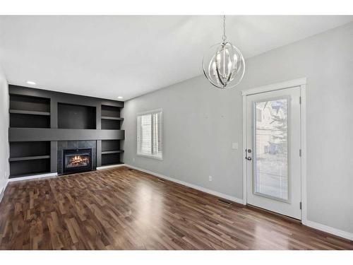 56 Arbours Circle Nw, Langdon, AB - Indoor With Fireplace