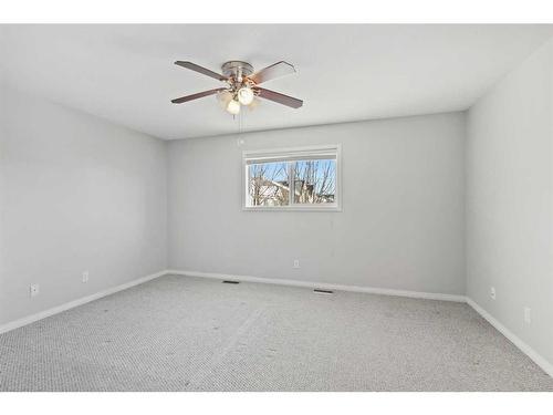 56 Arbours Circle Nw, Langdon, AB - Indoor Photo Showing Other Room