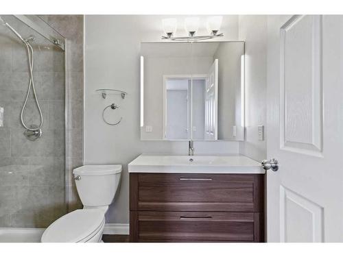 56 Arbours Circle Nw, Langdon, AB - Indoor Photo Showing Bathroom