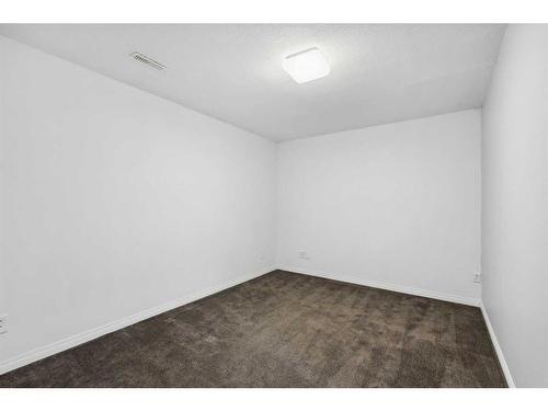 56 Arbours Circle Nw, Langdon, AB - Indoor Photo Showing Other Room