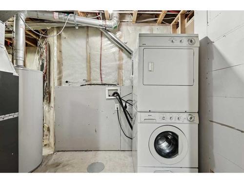 56 Arbours Circle Nw, Langdon, AB - Indoor Photo Showing Laundry Room