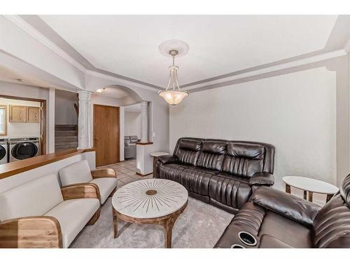 26 Arbour Butte Road Nw, Calgary, AB - Indoor Photo Showing Living Room