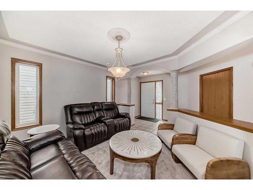 26 Arbour Butte Road Nw, Calgary, AB - Indoor Photo Showing Living Room