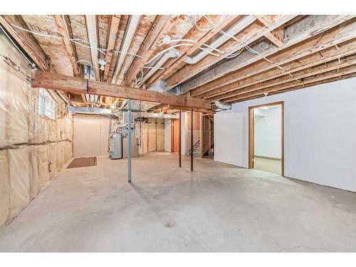 26 Arbour Butte Road Nw, Calgary, AB - Indoor Photo Showing Basement