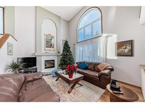 108 Citadel Circle Nw, Calgary, AB - Indoor Photo Showing Living Room With Fireplace