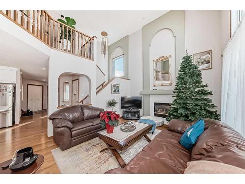 108 Citadel Circle Nw, Calgary, AB - Indoor Photo Showing Living Room With Fireplace