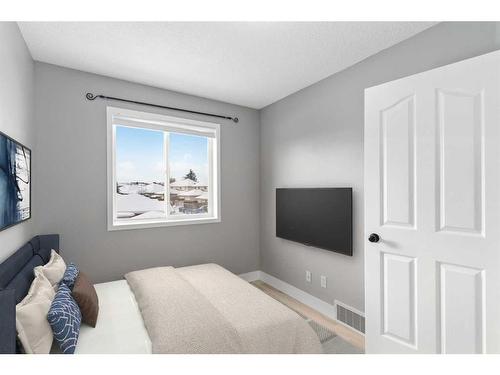 144 Chaparral Ridge Circle Se, Calgary, AB - Indoor Photo Showing Bedroom