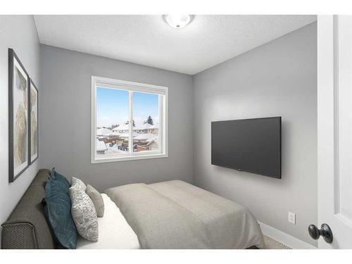 144 Chaparral Ridge Circle Se, Calgary, AB - Indoor Photo Showing Bedroom