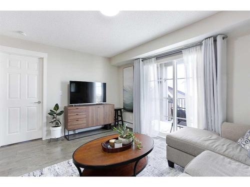 5303-279 Copperpond Common Se, Calgary, AB - Indoor Photo Showing Living Room