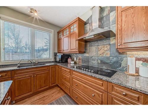 96 Evergreen Square Sw, Calgary, AB - Indoor Photo Showing Kitchen With Double Sink