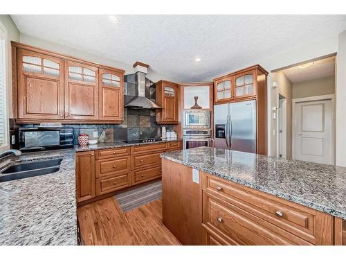 96 Evergreen Square Sw, Calgary, AB - Indoor Photo Showing Kitchen With Double Sink