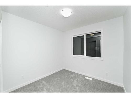 414-137 Red Embers Link Ne, Calgary, AB - Indoor Photo Showing Other Room