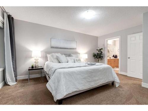 38-39 Strathlea Common Sw, Calgary, AB - Indoor Photo Showing Bedroom