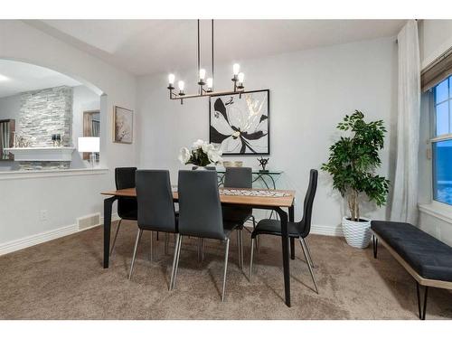 38-39 Strathlea Common Sw, Calgary, AB - Indoor Photo Showing Dining Room