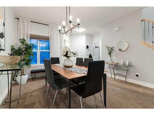 38-39 Strathlea Common Sw, Calgary, AB - Indoor Photo Showing Dining Room