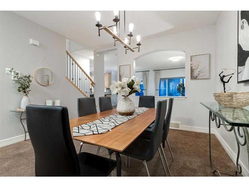 38-39 Strathlea Common Sw, Calgary, AB - Indoor Photo Showing Dining Room