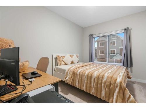 459 Canals Crossing Sw, Airdrie, AB - Indoor Photo Showing Bedroom