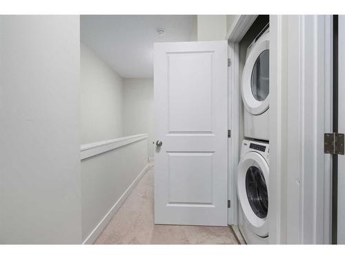 459 Canals Crossing Sw, Airdrie, AB - Indoor Photo Showing Laundry Room