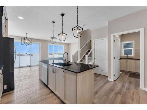 26 Cobbleridge Place Sw, Airdrie, AB - Indoor Photo Showing Kitchen