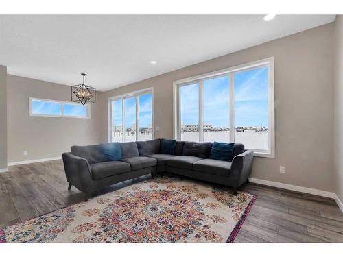 26 Cobbleridge Place Sw, Airdrie, AB - Indoor Photo Showing Living Room