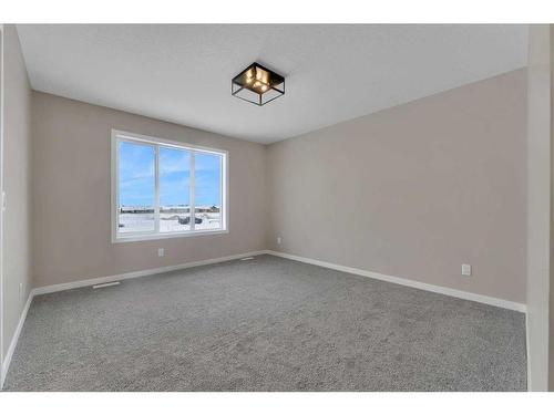 26 Cobbleridge Place Sw, Airdrie, AB - Indoor Photo Showing Other Room