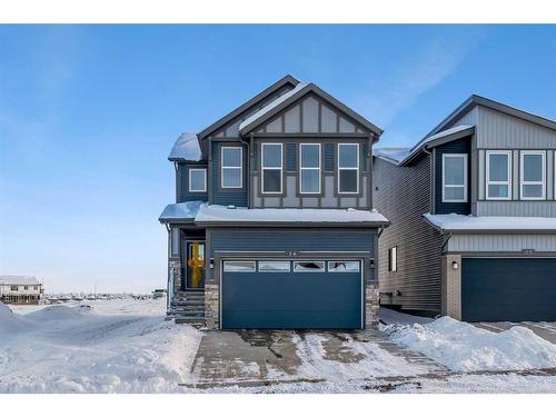 26 Cobbleridge Place Sw, Airdrie, AB - Outdoor With Facade