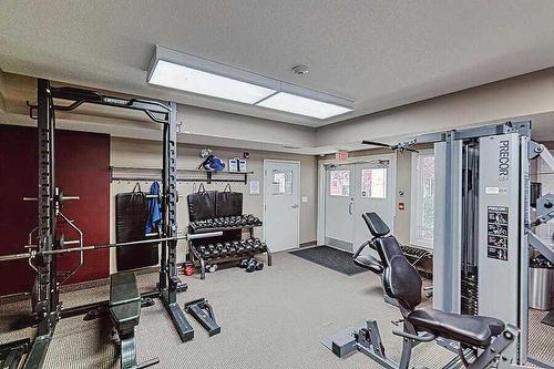 335-60 Royal Oak Plaza Nw, Calgary, AB - Indoor Photo Showing Gym Room