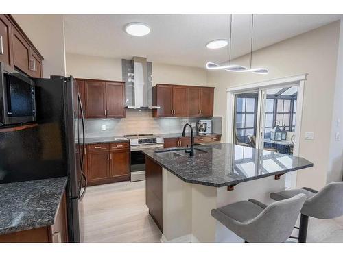 9 Silverado Saddle Heights Sw, Calgary, AB - Indoor Photo Showing Kitchen With Double Sink With Upgraded Kitchen