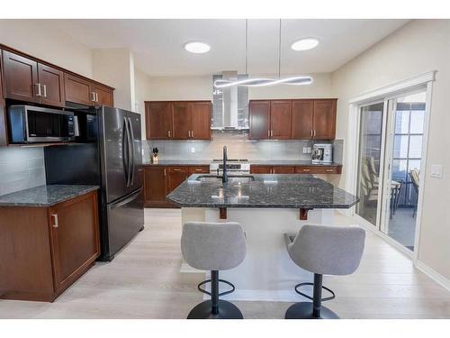 9 Silverado Saddle Heights Sw, Calgary, AB - Indoor Photo Showing Kitchen With Stainless Steel Kitchen