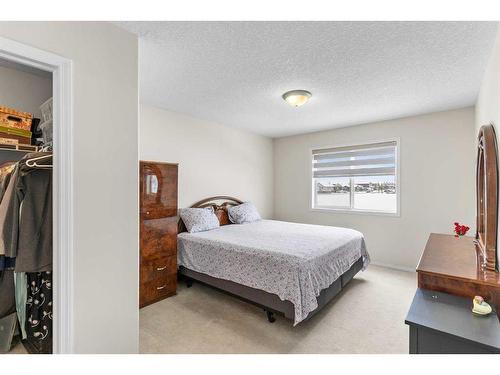 343 Taracove Estate Drive Ne, Calgary, AB - Indoor Photo Showing Bedroom