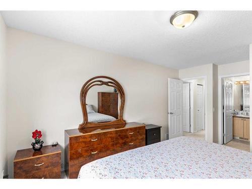 343 Taracove Estate Drive Ne, Calgary, AB - Indoor Photo Showing Bedroom