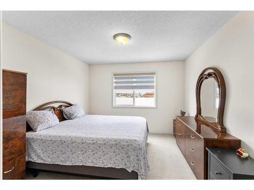 343 Taracove Estate Drive Ne, Calgary, AB - Indoor Photo Showing Bedroom