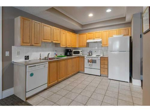 3234-1010 Arbour Lake Road Nw, Calgary, AB - Indoor Photo Showing Kitchen