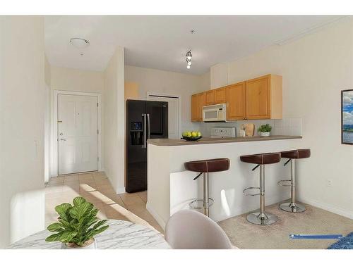 3234-1010 Arbour Lake Road Nw, Calgary, AB - Indoor Photo Showing Kitchen