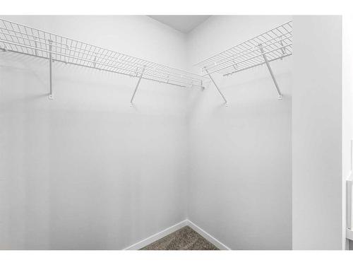 127 Aquila Drive Nw, Calgary, AB - Indoor With Storage