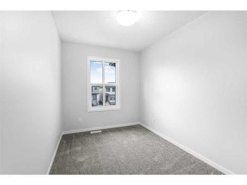 127 Aquila Drive Nw, Calgary, AB - Indoor Photo Showing Other Room