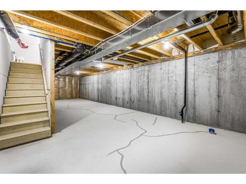 127 Aquila Drive Nw, Calgary, AB - Indoor Photo Showing Basement